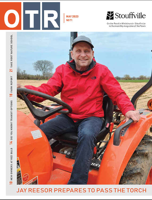 May cover of On the Road with Man on orange tractor